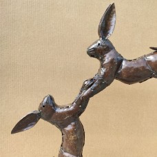 Small boxing hares sculpture